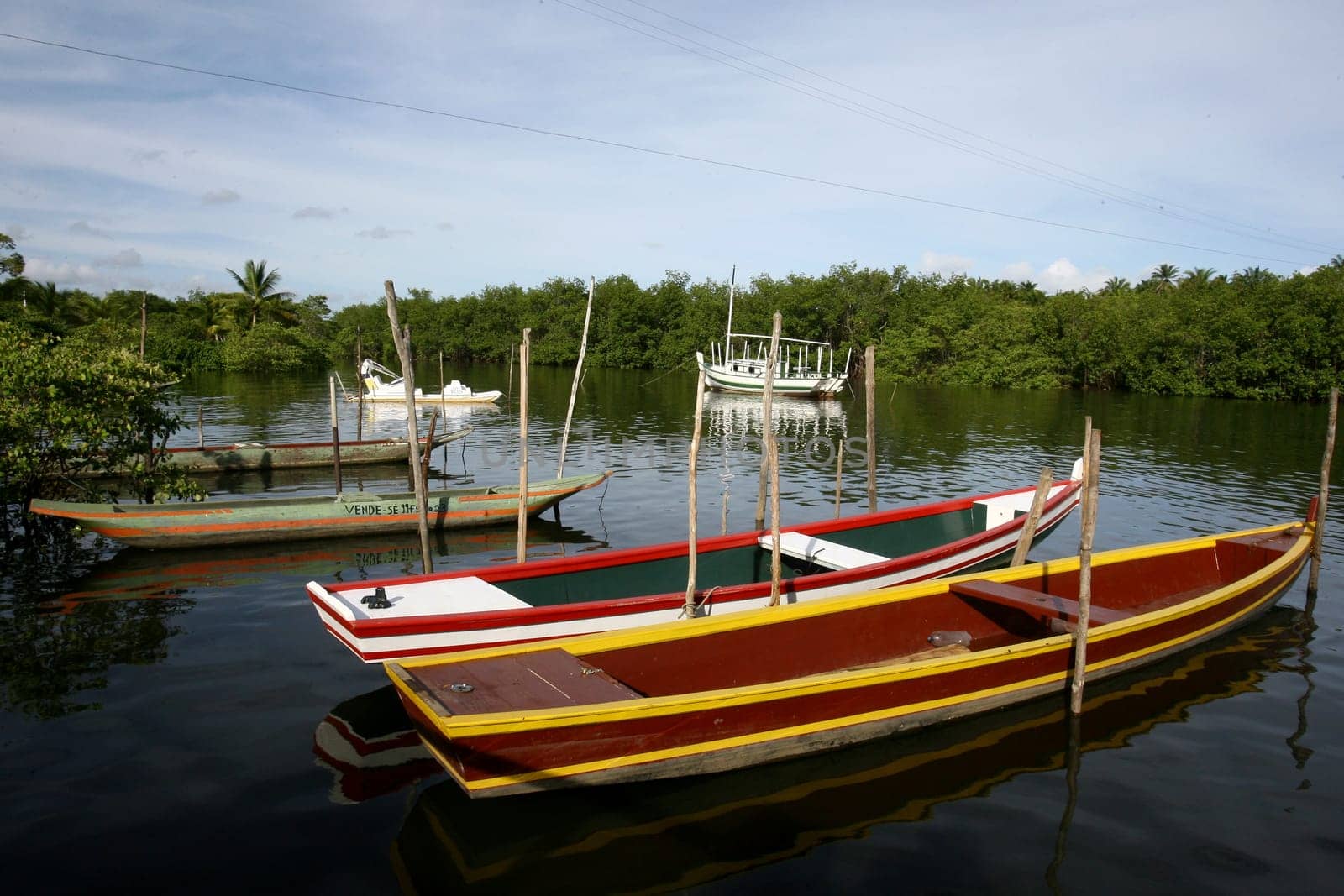 camamu, bahia / brazil - january 10, 2012: canoes are seen in Baia de Camamu, in the city of Camamu, in southern Bahia.