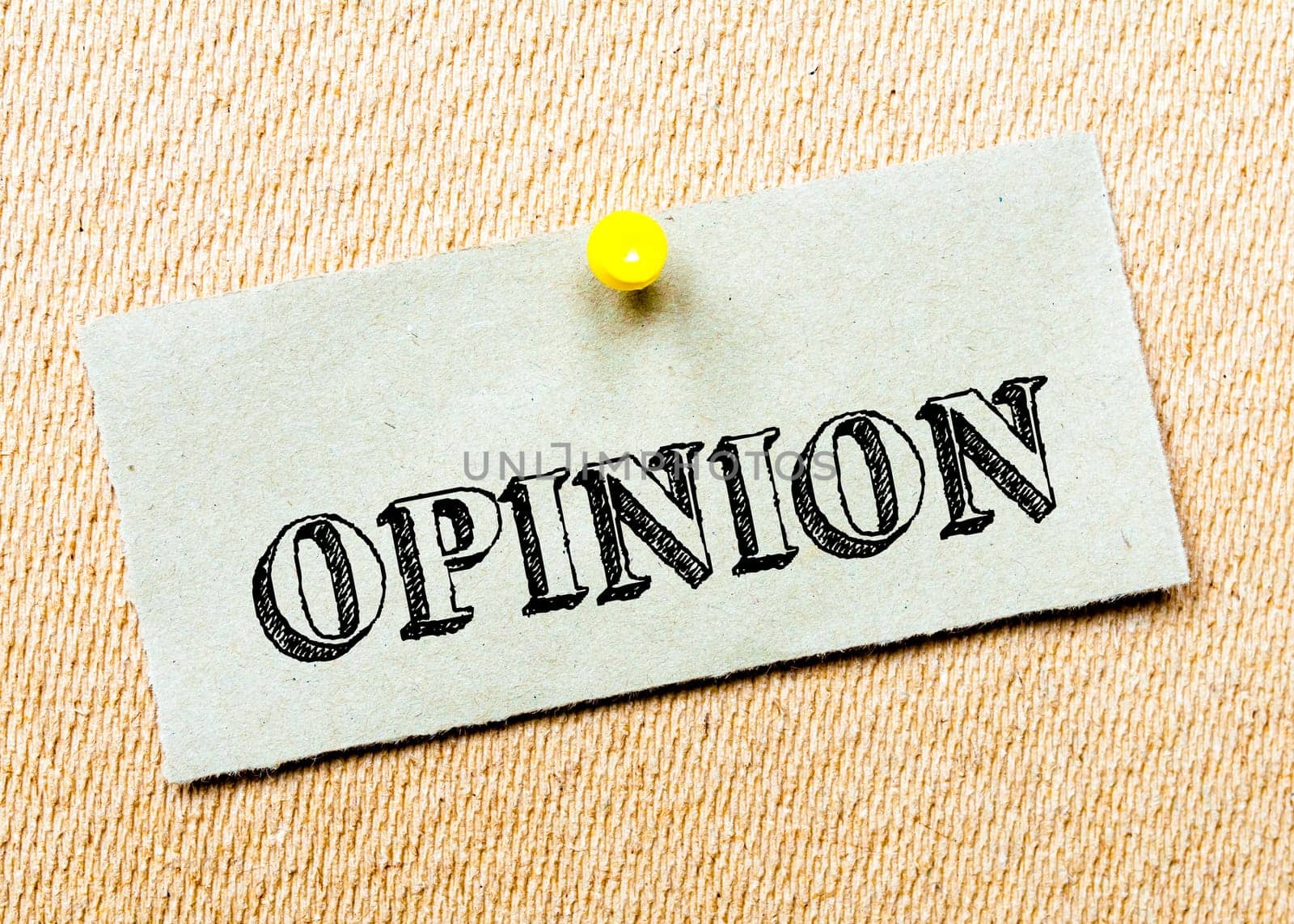 Recycled paper note pinned on cork board. Opinion Message. Concept Image