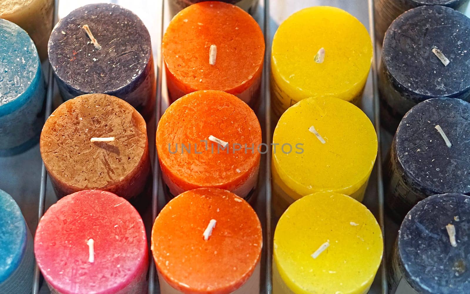 Scented candles in different colours