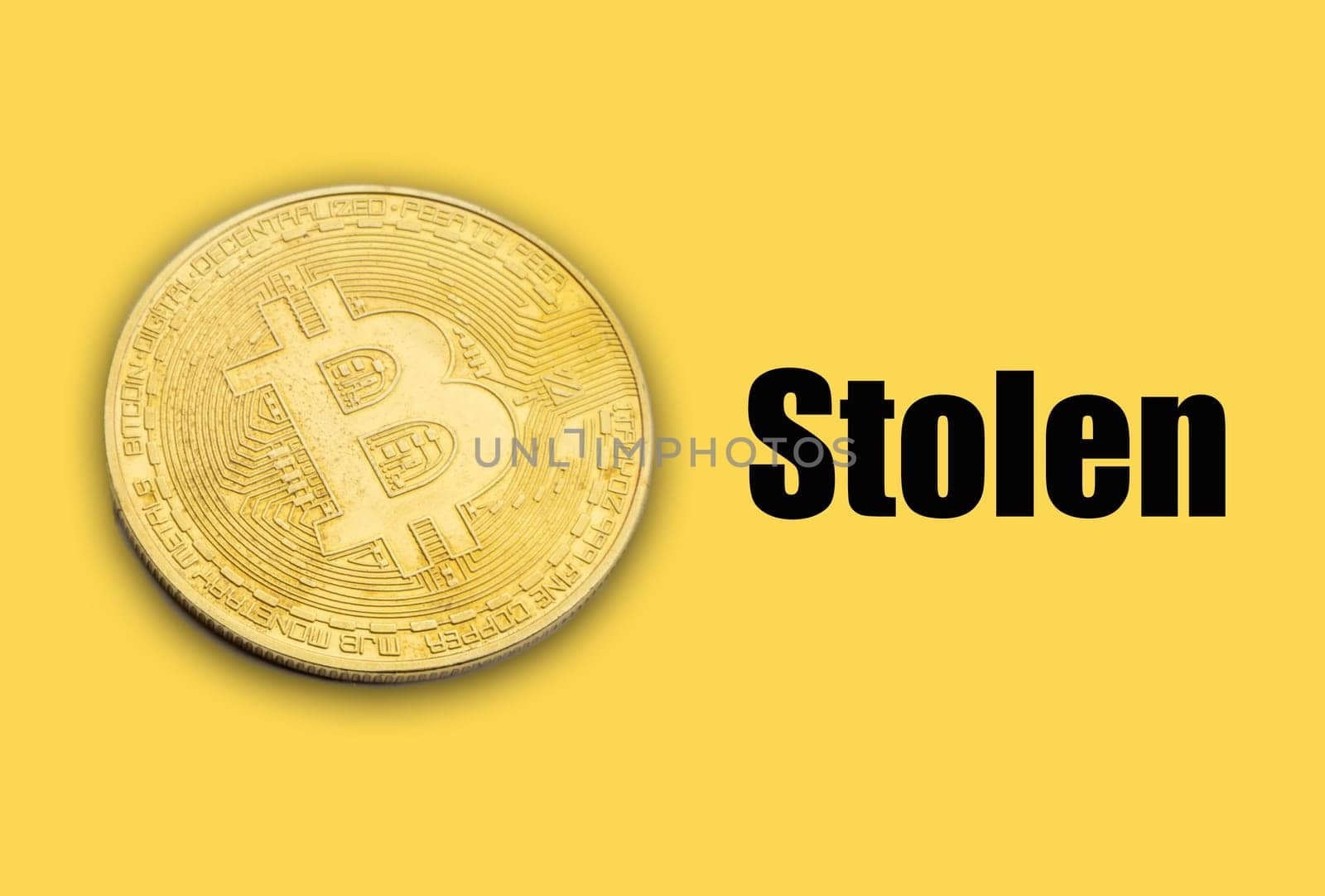 BITCOIN STOLEN text on yellow background. Cryptocurrency theft concept