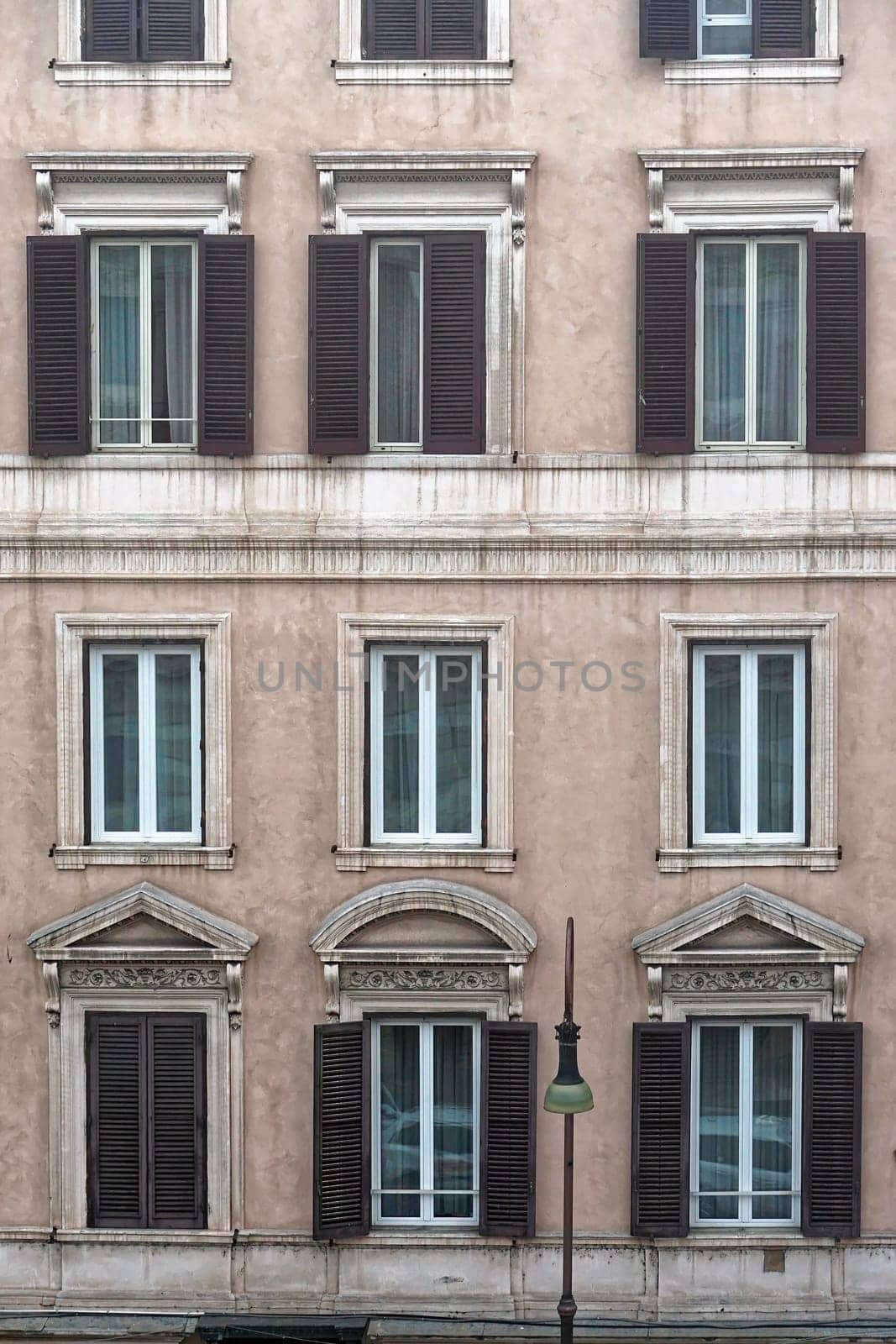 Windows at classic style building in Rome