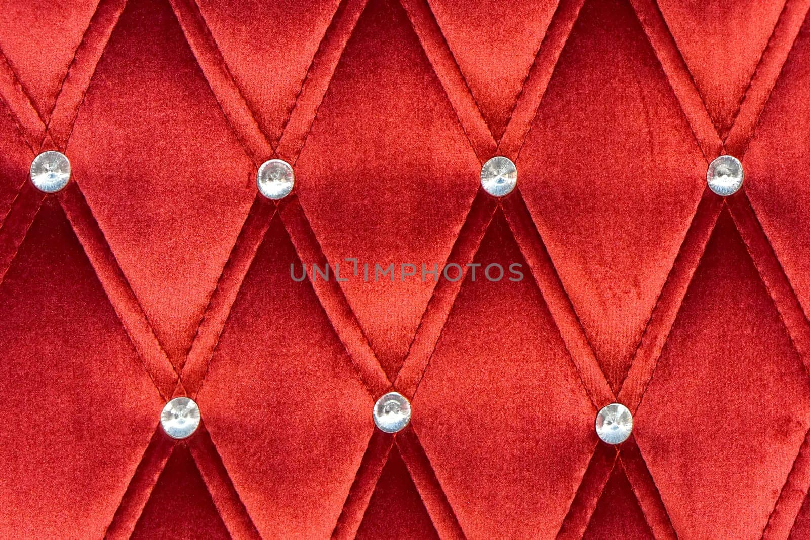 Red upholstery pattern with zircons decoration