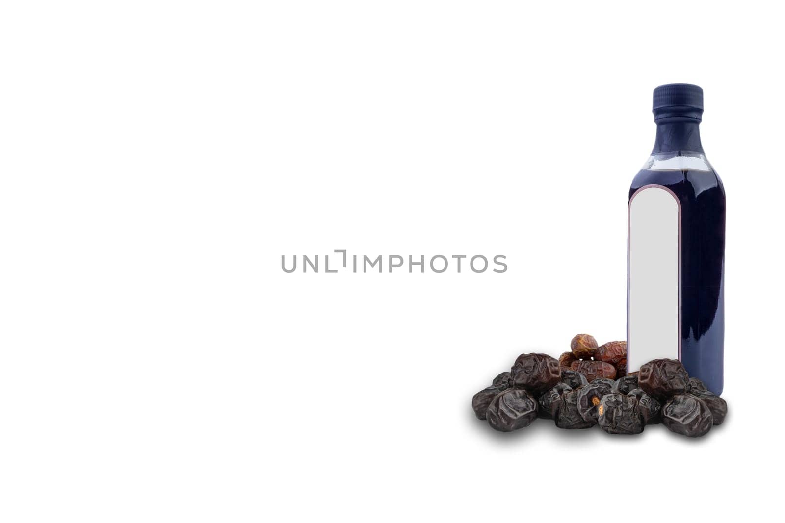 Dates Vinegar bottle and Dates fruit on white background. Copy space concept