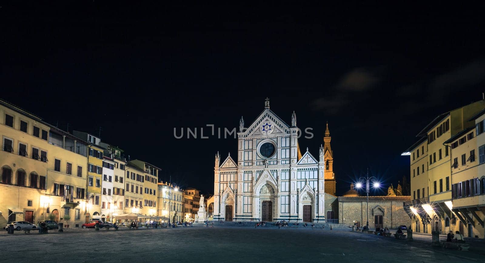 The Basilica di Santa Croce and the Piazza di Santa Croce in Florence, Italy at night