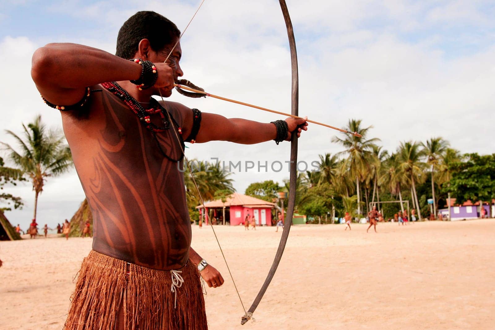 santa cruz cabralia, bahia / brazil - april 17, 2010: indians of the pataxo ethnic group are seen during indigenous games in the Coroa Vermelha village in the city of Santa Cruz Cabralia, in southern Bahia.