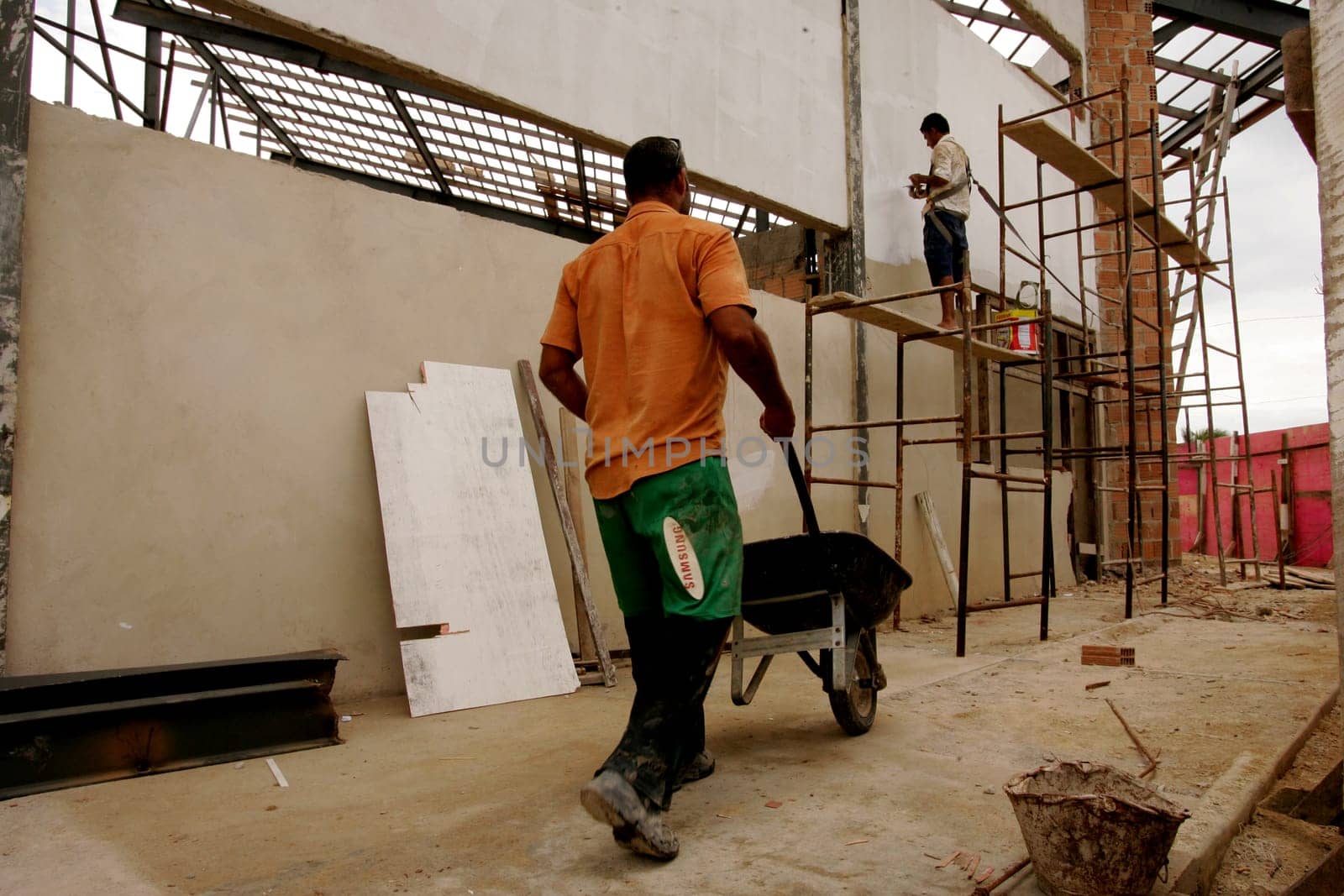 porto seguro, bahia / brazil - november 10, 2010: civil construction workers are seen working on renovating the airport in the city of Porto Seguro, in southern Bahia.