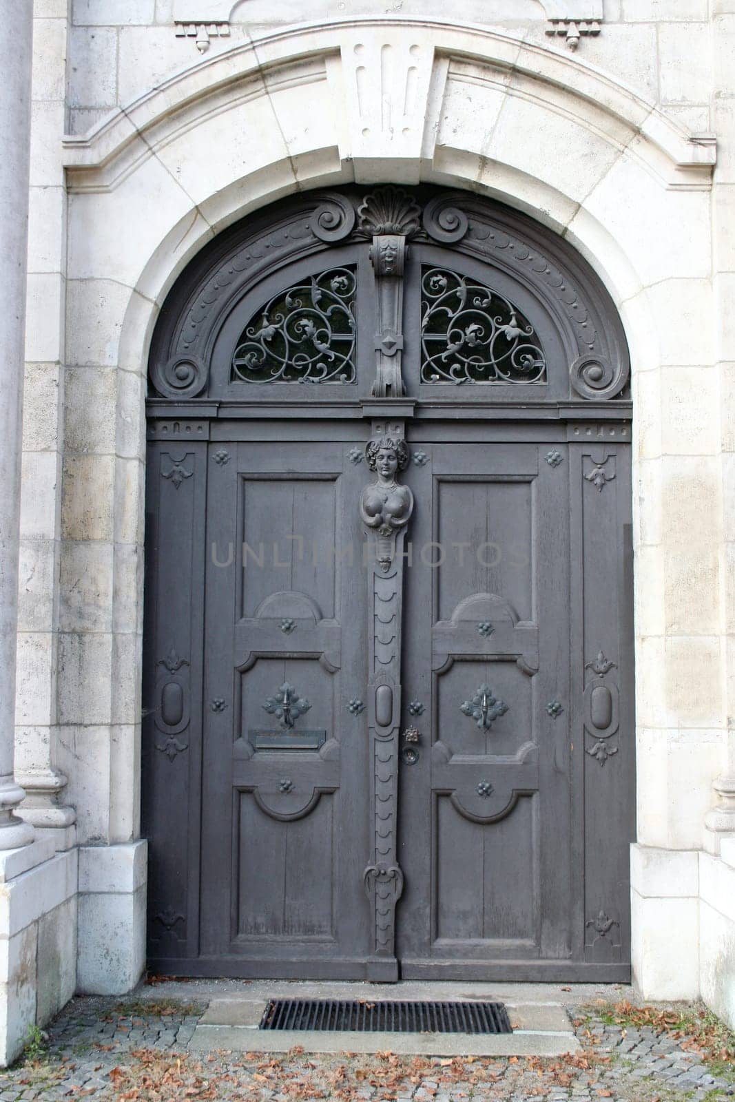 a beautiful wooden door of an old house