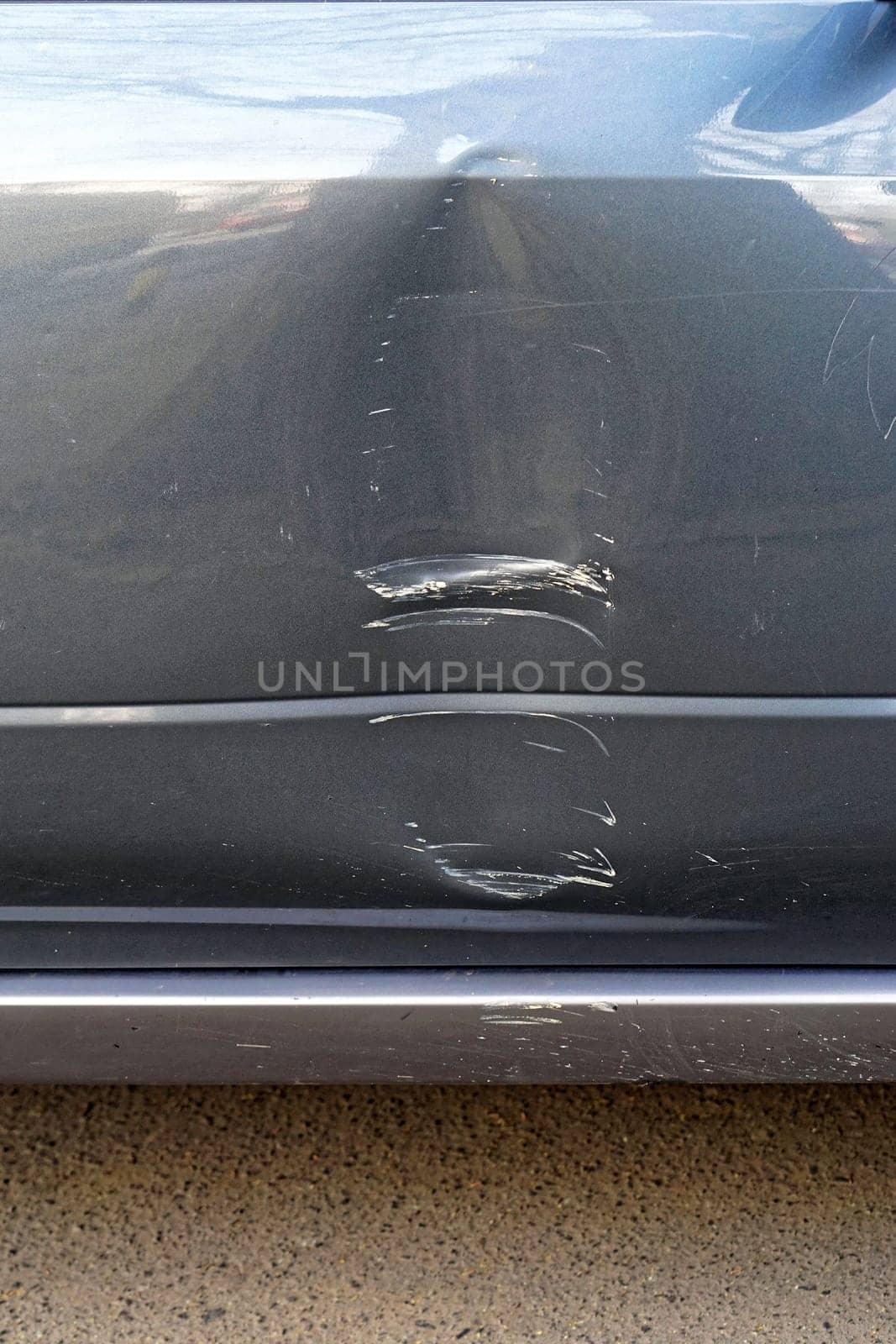 Big dent at car door damage