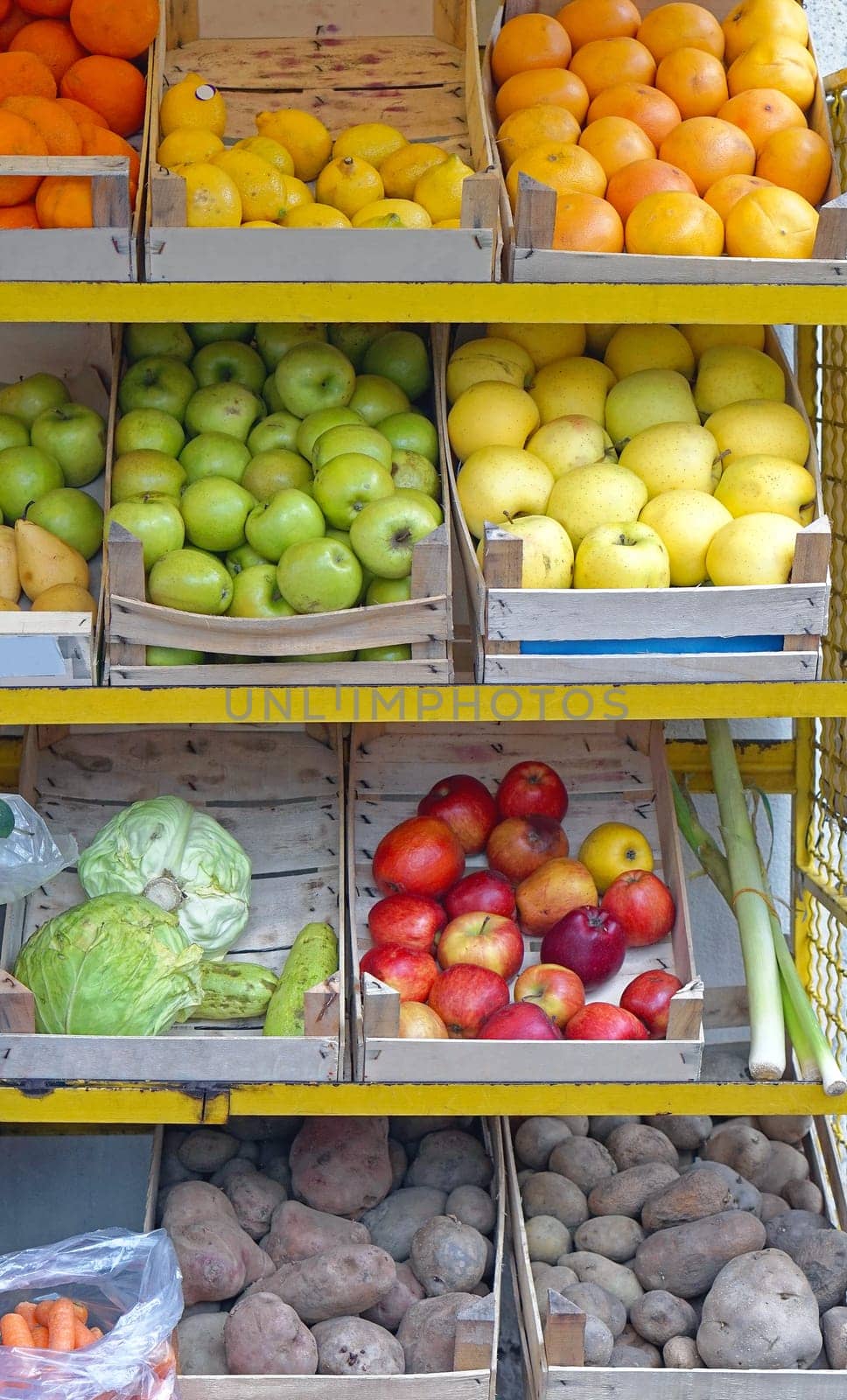 Crates with fresh fruits and vegetables