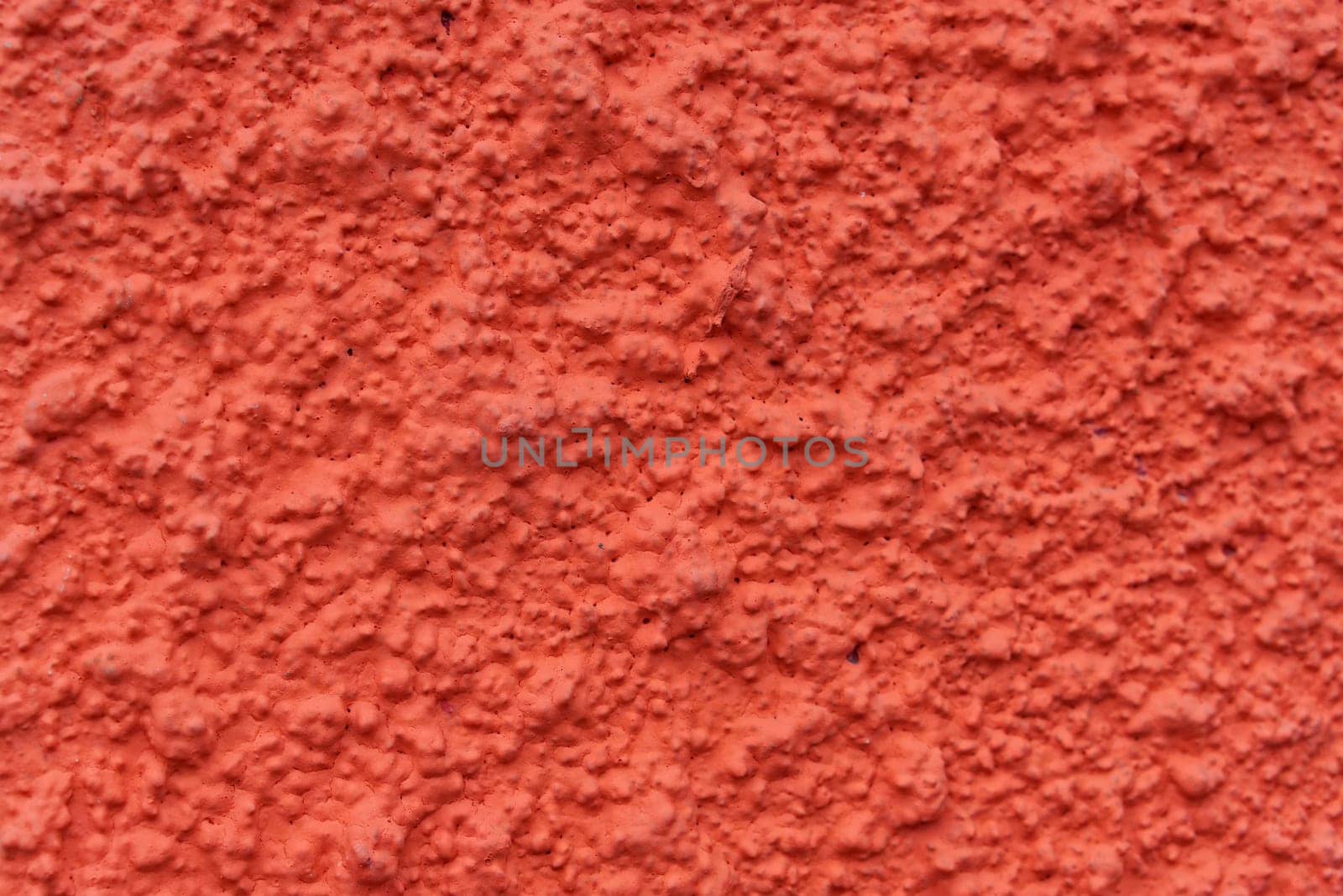 Rough structure of red wall background