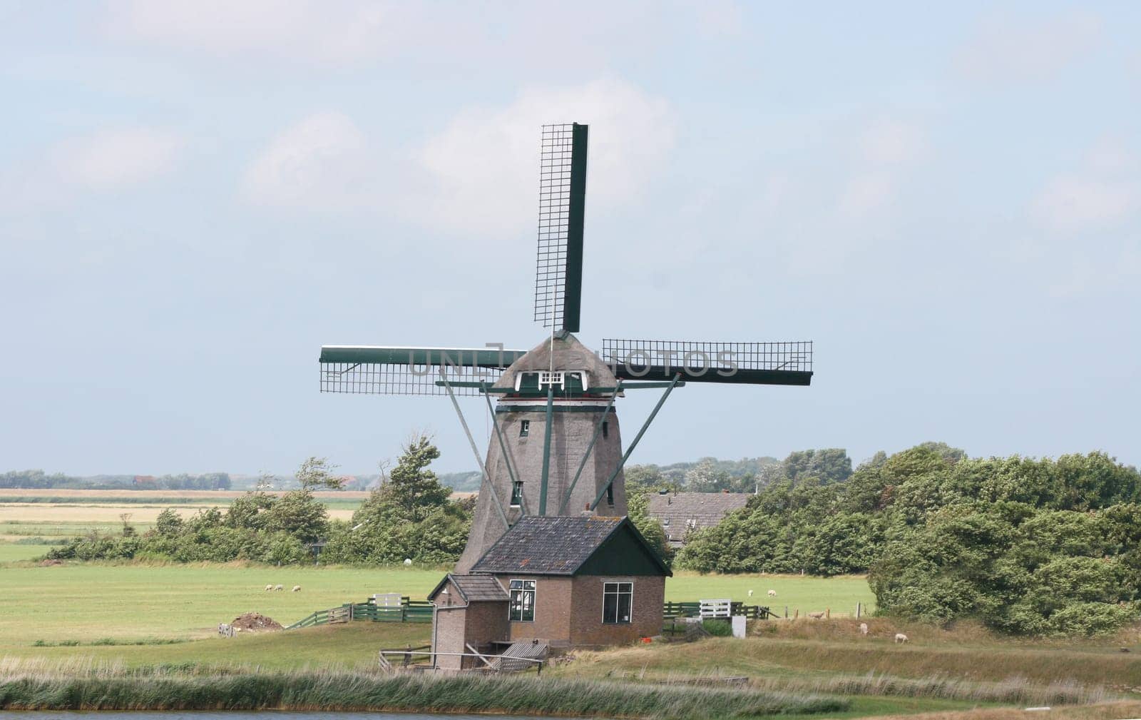 A beautiful old historic windmill, with four wings