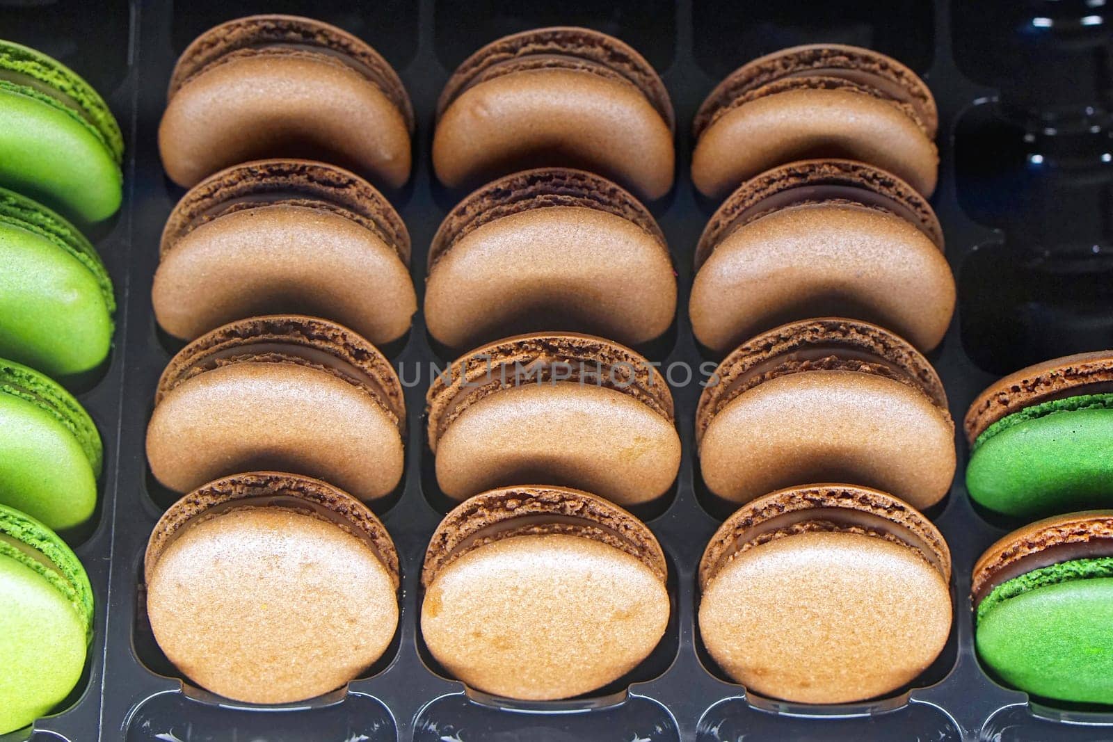 French chocolate macaroons cookies at tray