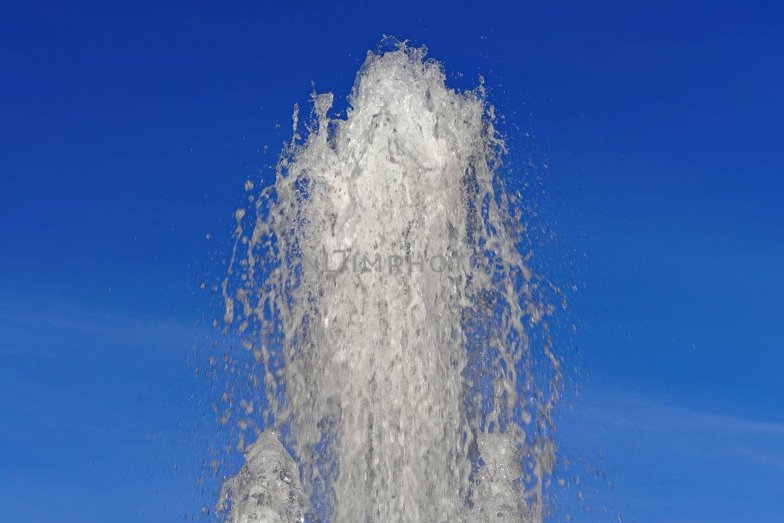 Jet of water in fountain geyser