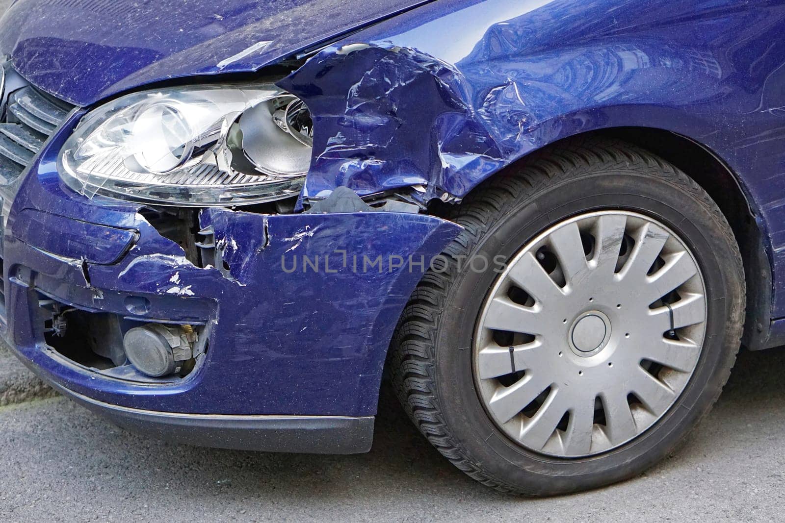 Damaged car front after traffic accident
