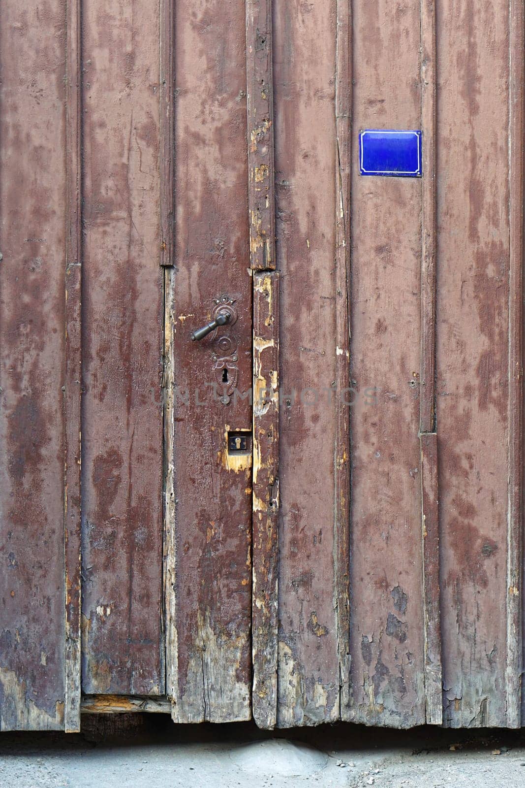 Grunge brown wood door old entrance