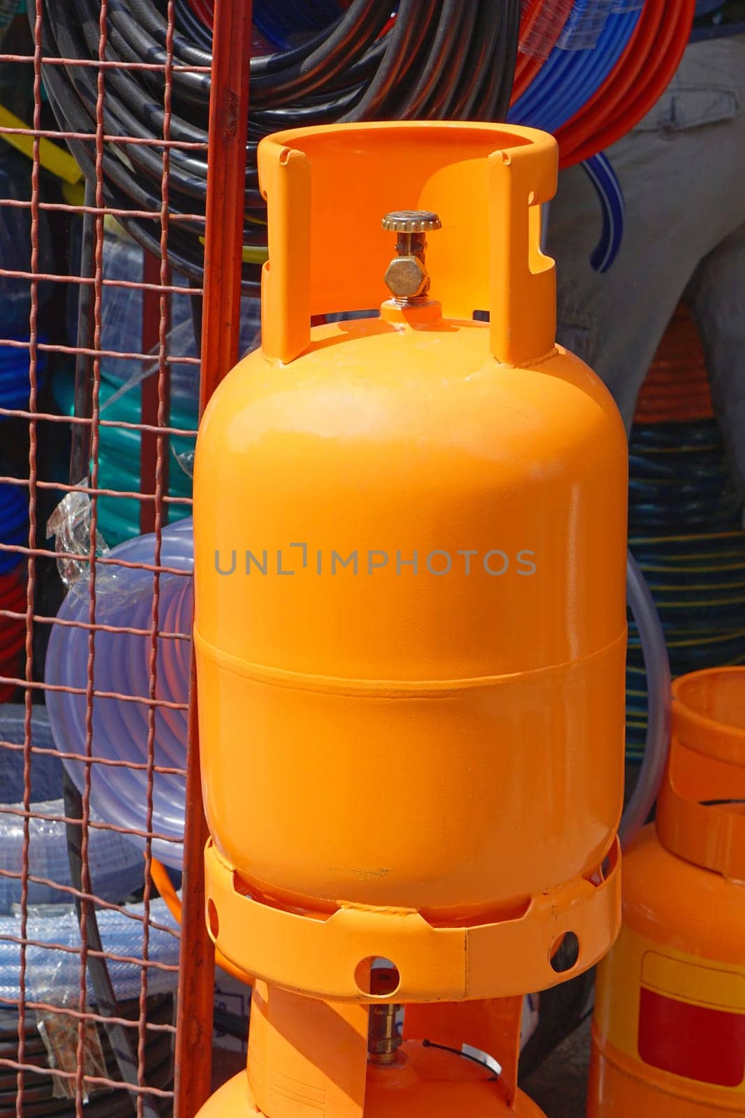 Big orange gas tank cylinder for home use