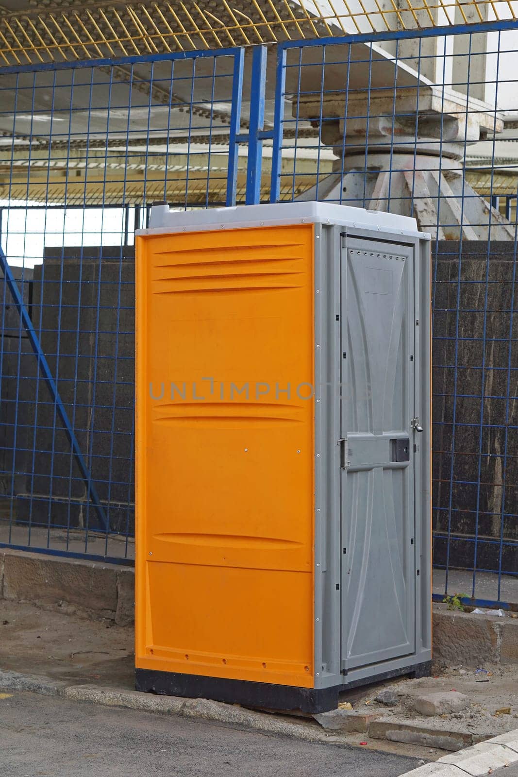 Portable toilet cabin at construction site