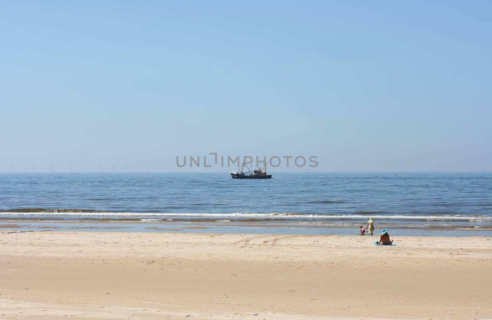 a long lonely sand beach, on the North Sea
