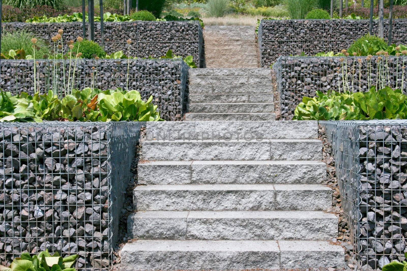 A straight running stone staircase .