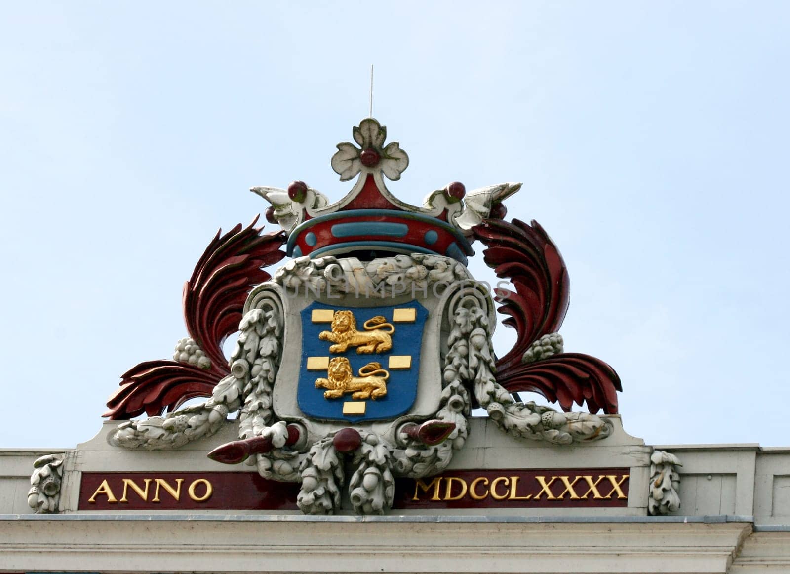 Coat of arms of Golden Lion, blue sky in the background