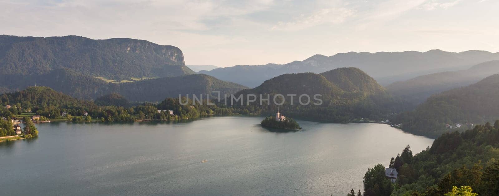 Lake Bled, island with a church and the alps in the background, Slovenia.