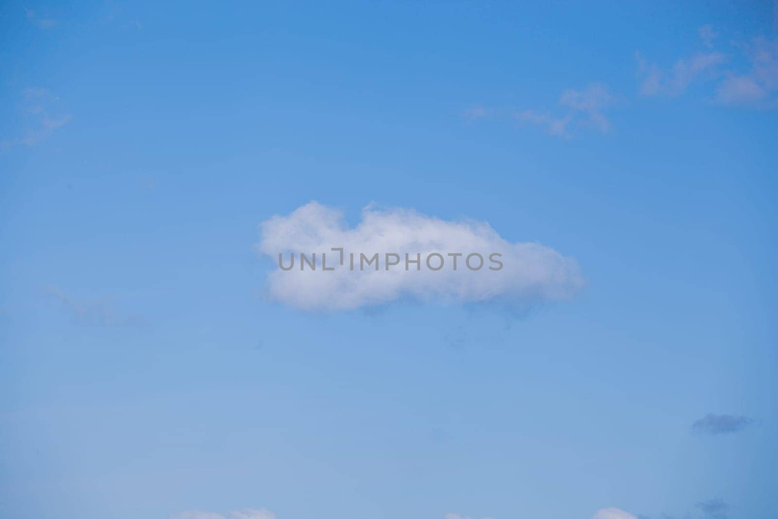 Low Angle View Of Clouds In Blue Sky.