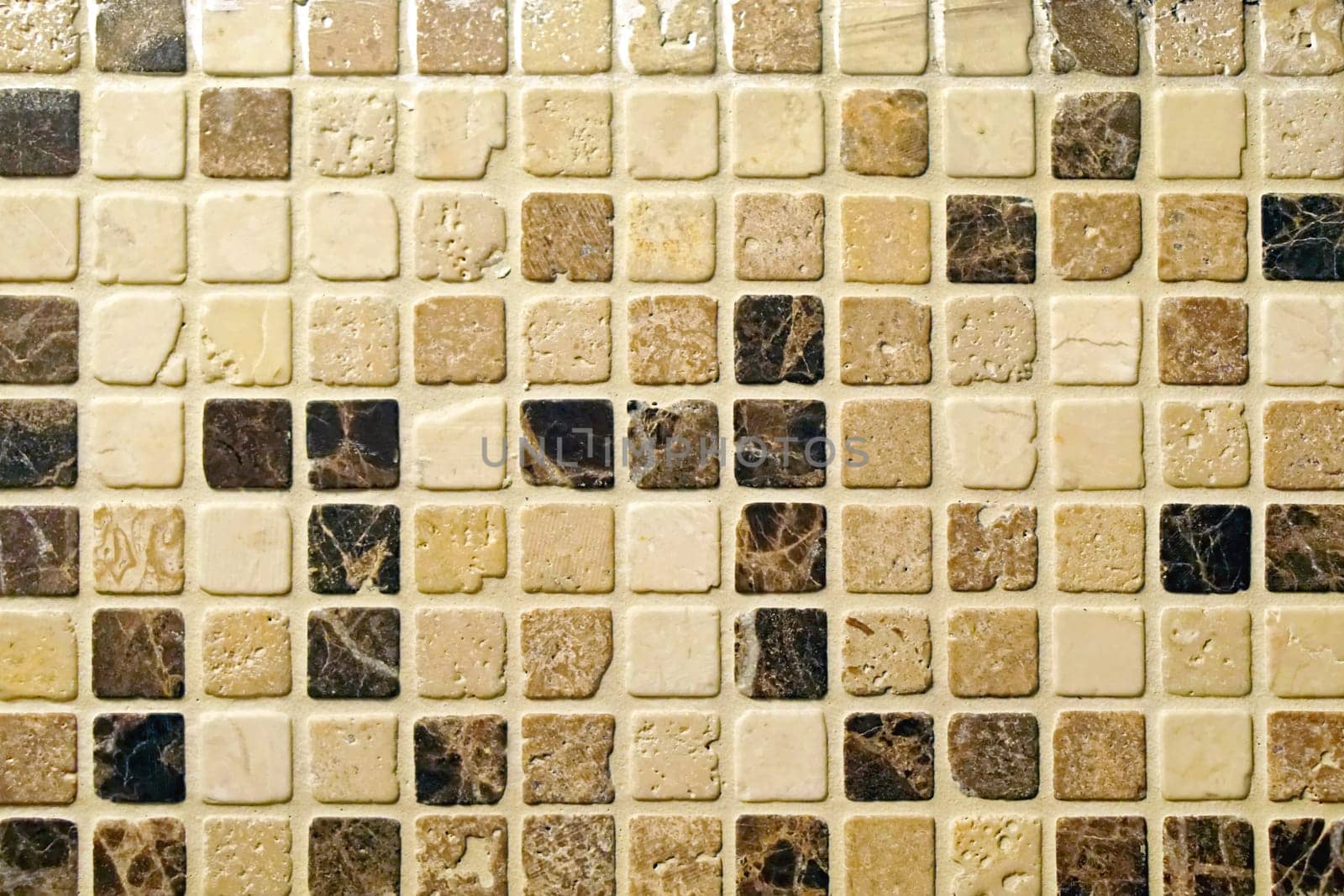 Small square mosaic wall tiles with rough edges