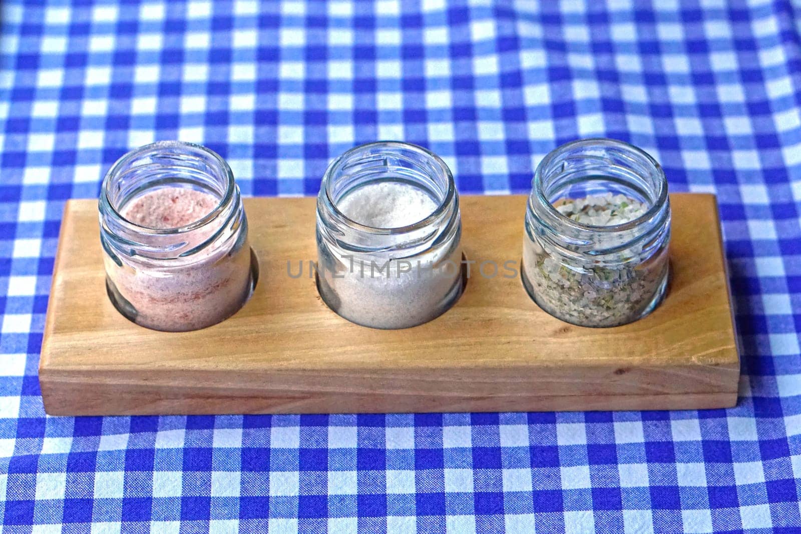 Three different salt seasoning in jars