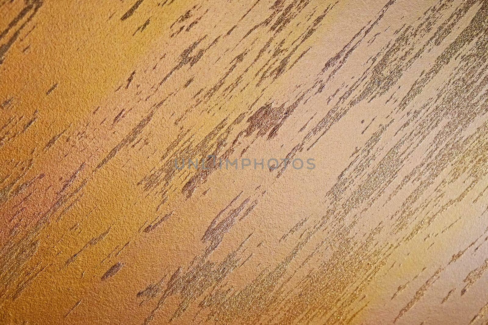 Gold wall with golden glitter texture background