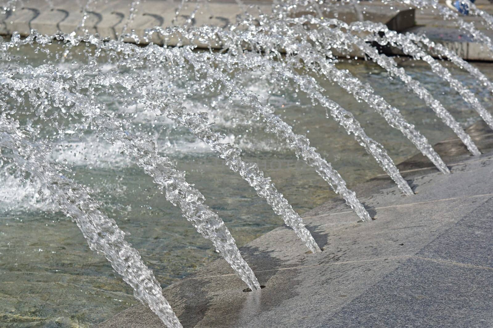 Decorative water fountain spray geysers with pond