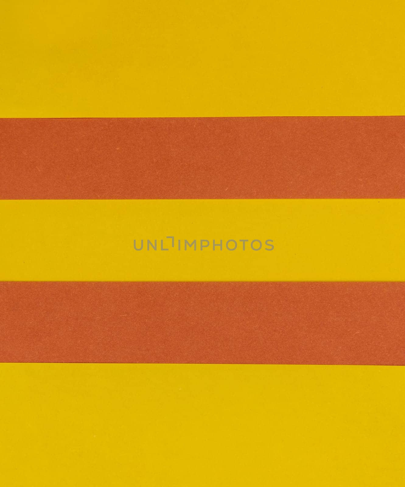 Yellow and Orange coloured paper background, abstract contrast conceptual image