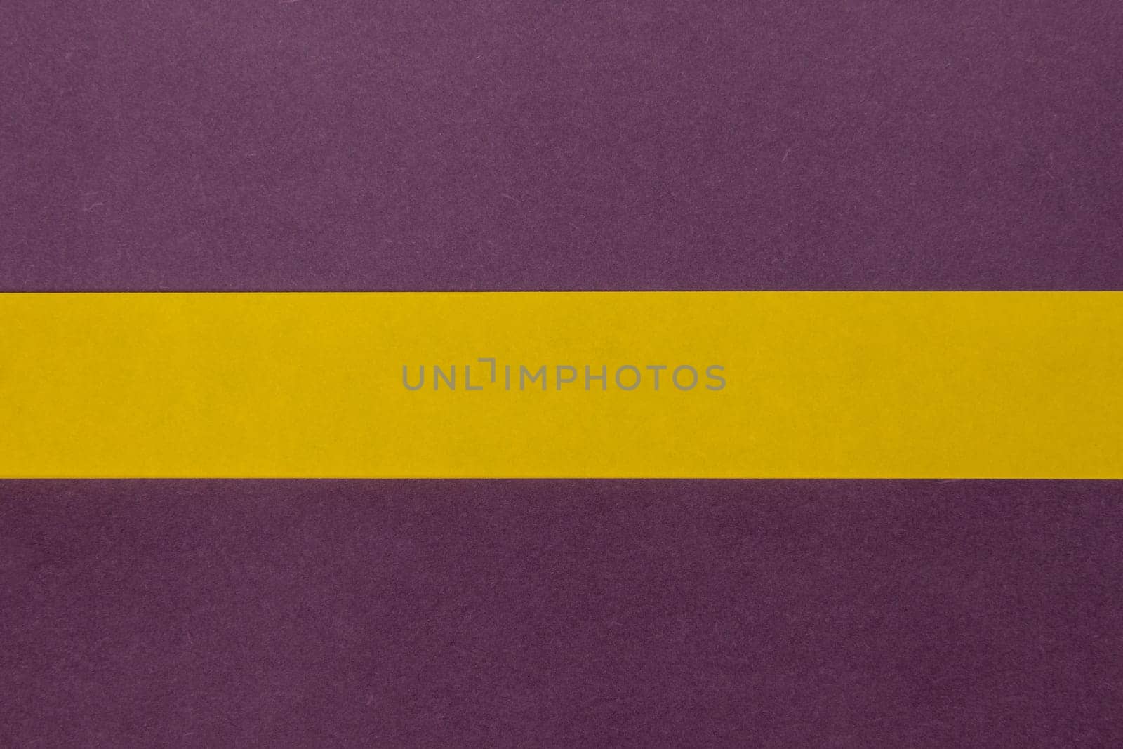 Purple and Yellow coloured paper background, abstract contrast conceptual image