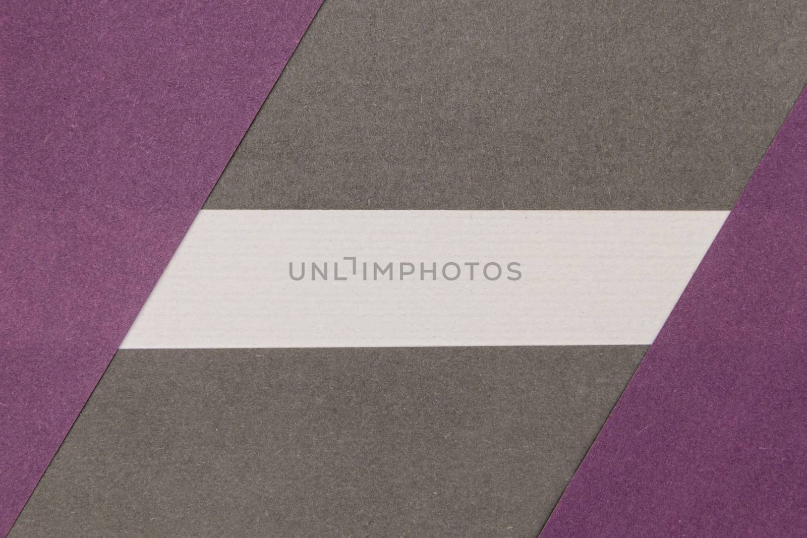 White, Grey and Purple coloured paper background, abstract contrast conceptual image