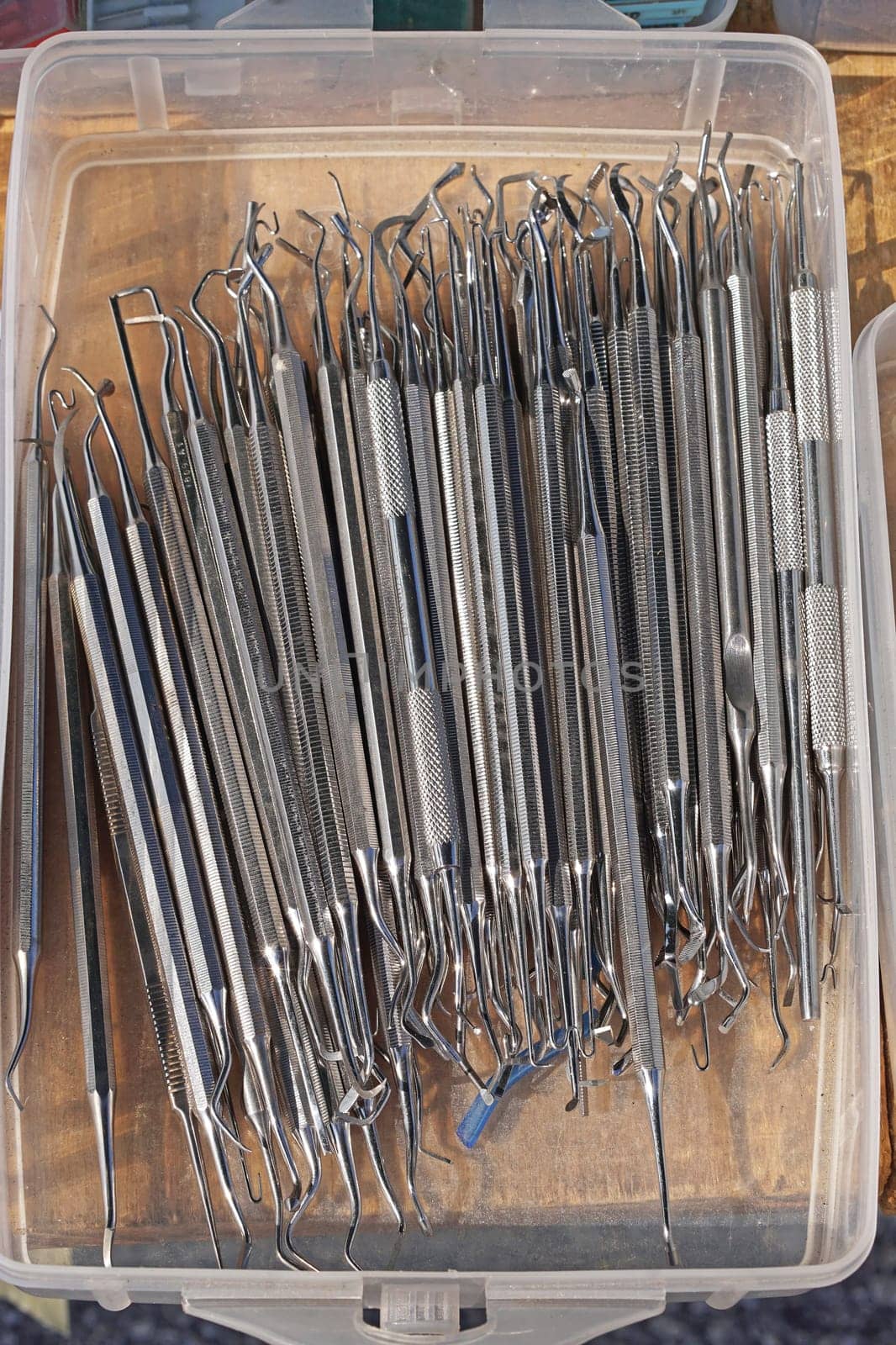 Collection of various medical dental instruments equipment in box