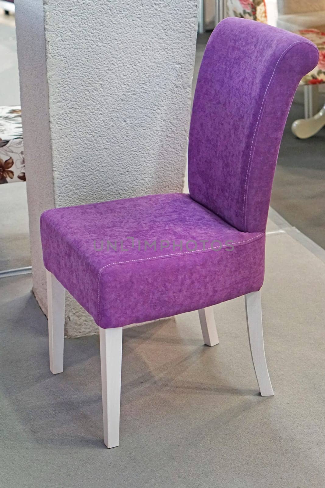 Purple textile chair in home interior