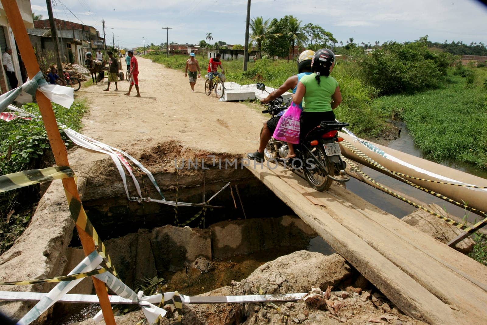 ilheus, bahia / brazil - mau 16, 2011: access bridge to the Coutos district in the city of Ilheus is seen destroyed after conflicts with local people.