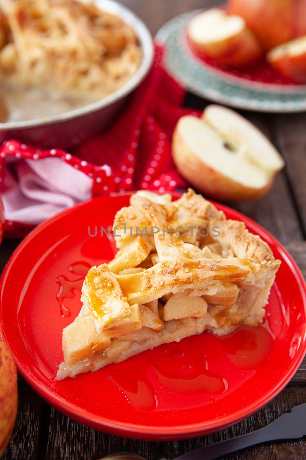 Delicious homemade apple pie on a red plate