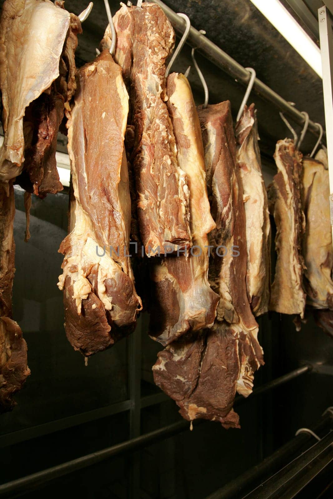 itamaraju, bahia / brazil - november 18, 2010: salted beef is seen for sale at a fair in the city of Itamaraju.