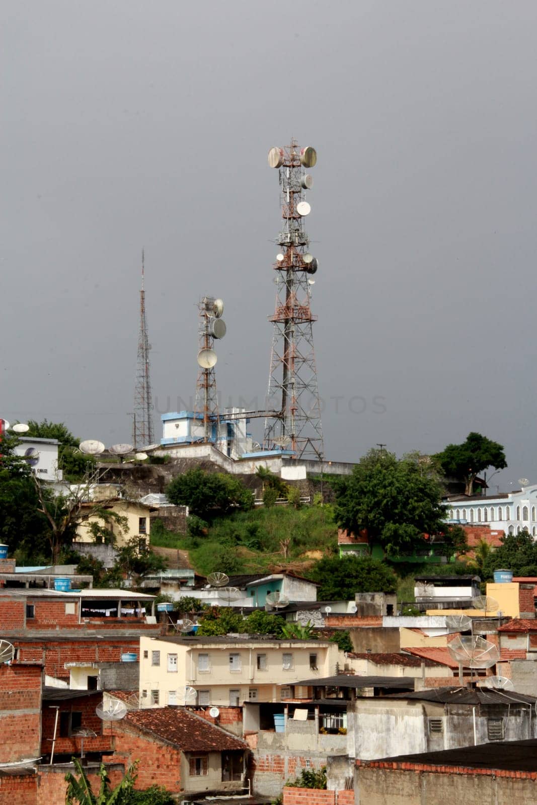 itabuna, bahia / brazil - july 15, 2012: tower with cell antennas is seen in the city of Itabuna, southern Bahia.