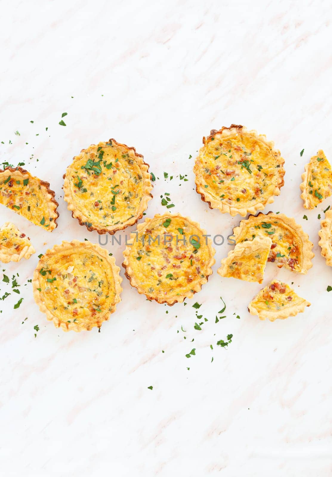 Mini quiche with egg and bacon bits