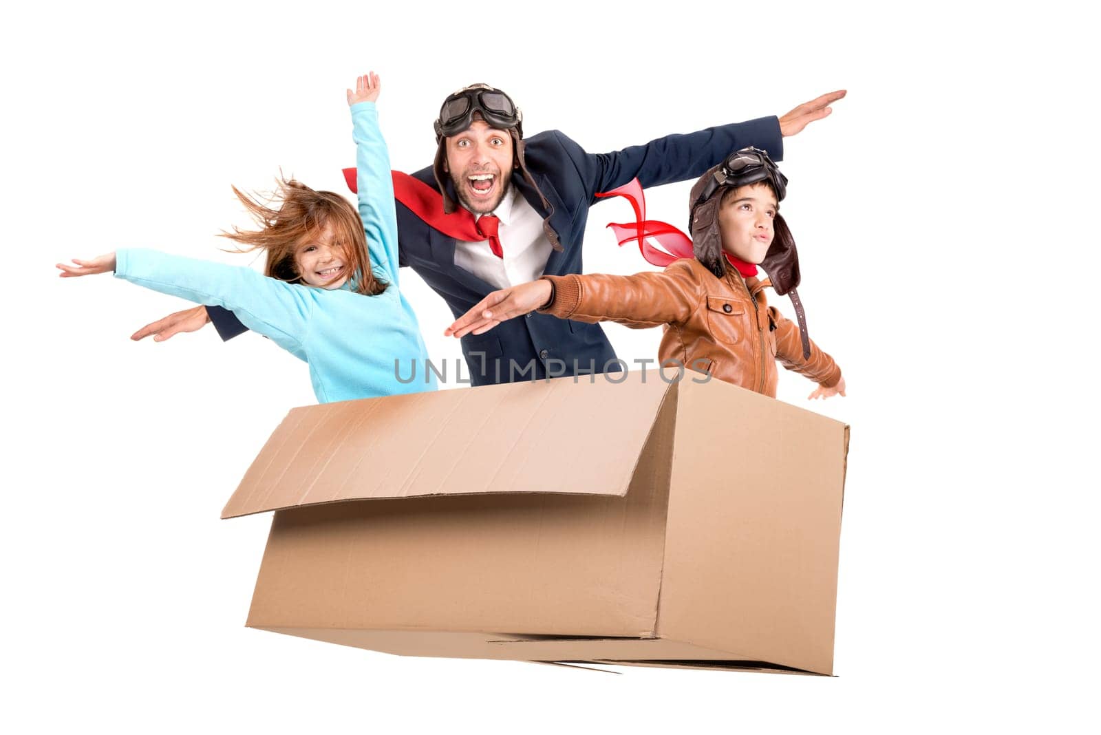Man and kids playing. flying in a carboard box isolated in white