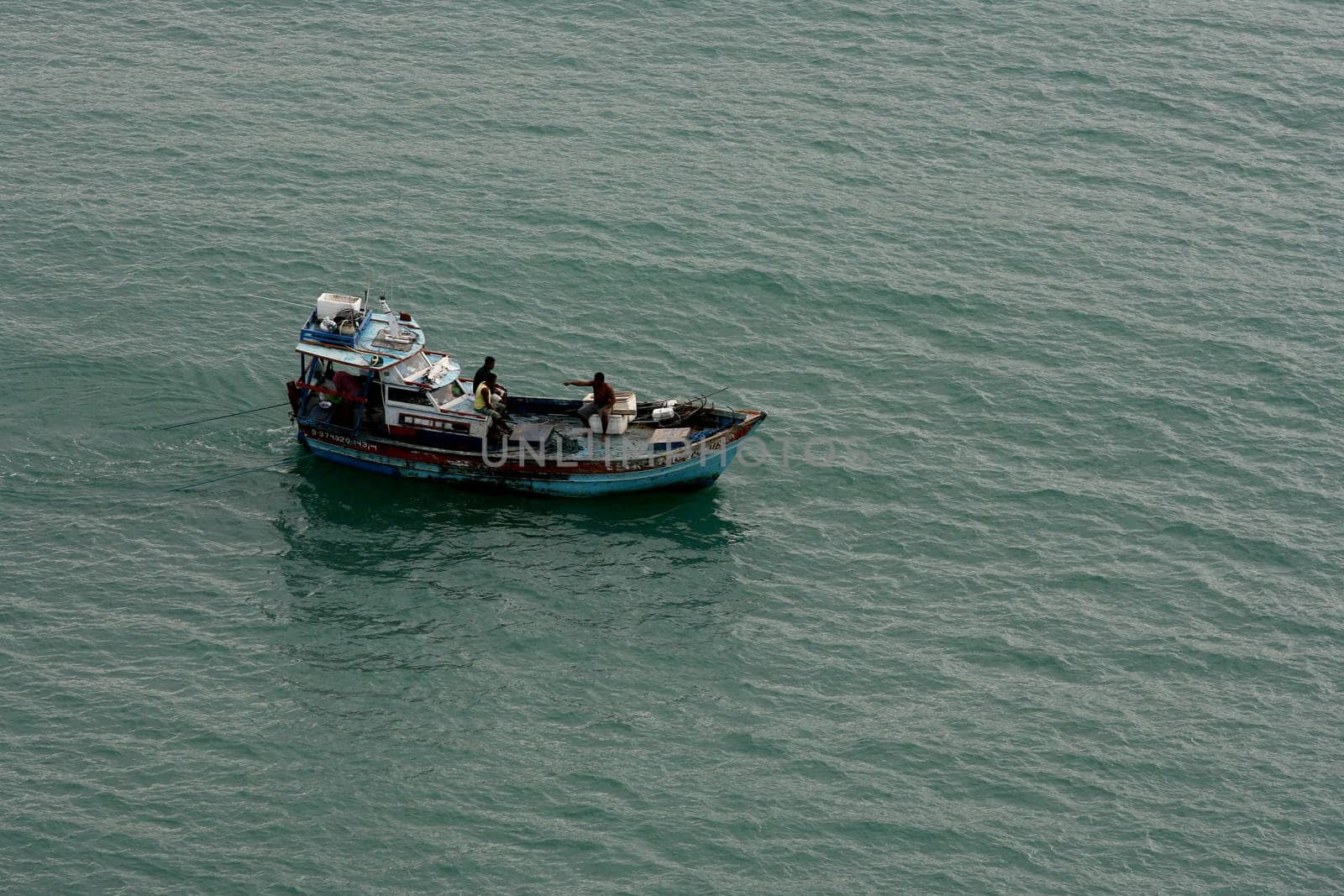 porto seguro, bahia / brazil - june 20, 2011: aerial view of a fishing boat at sea in the Trancoso region, in the city of Porto Seguro, in the south of Bahia...