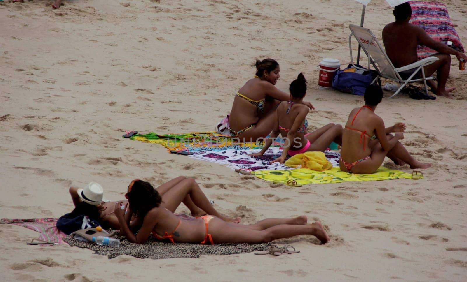 salvador, bahia / brazil - november 23, 2014: women are seen at Barra beach in the city of Salvador.