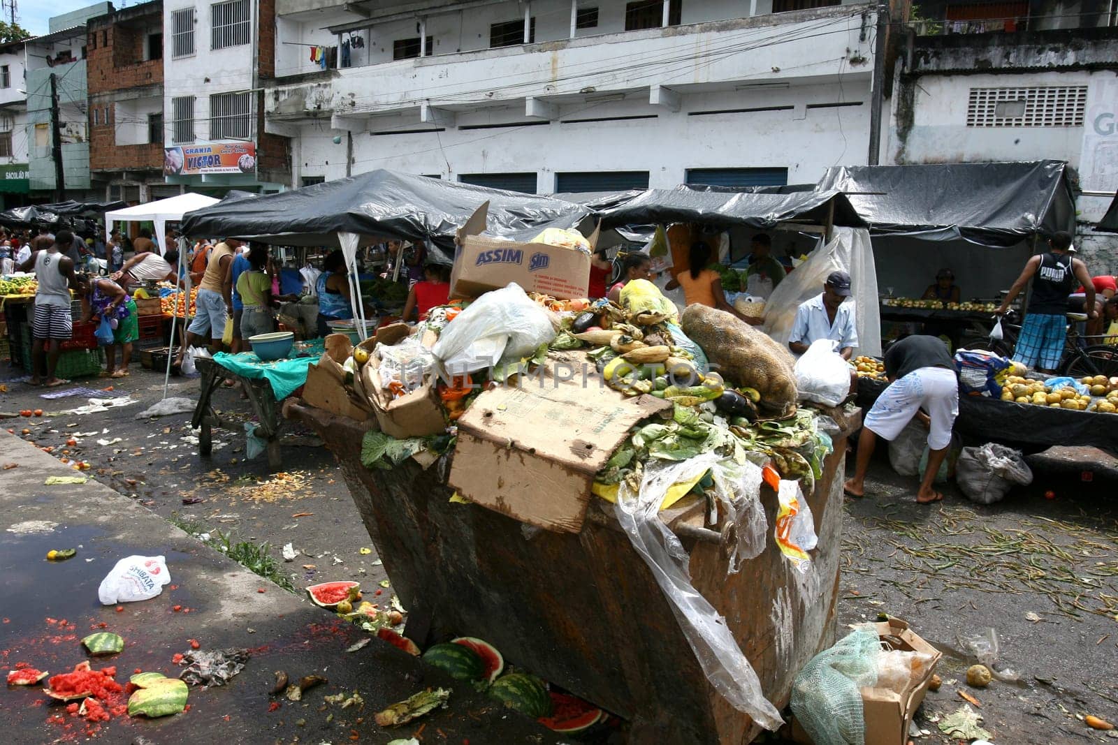 itabuna, bahia / brazil - november 27, 2011: Food is thrown in the trash at a free fair in the citu of Itabuna.