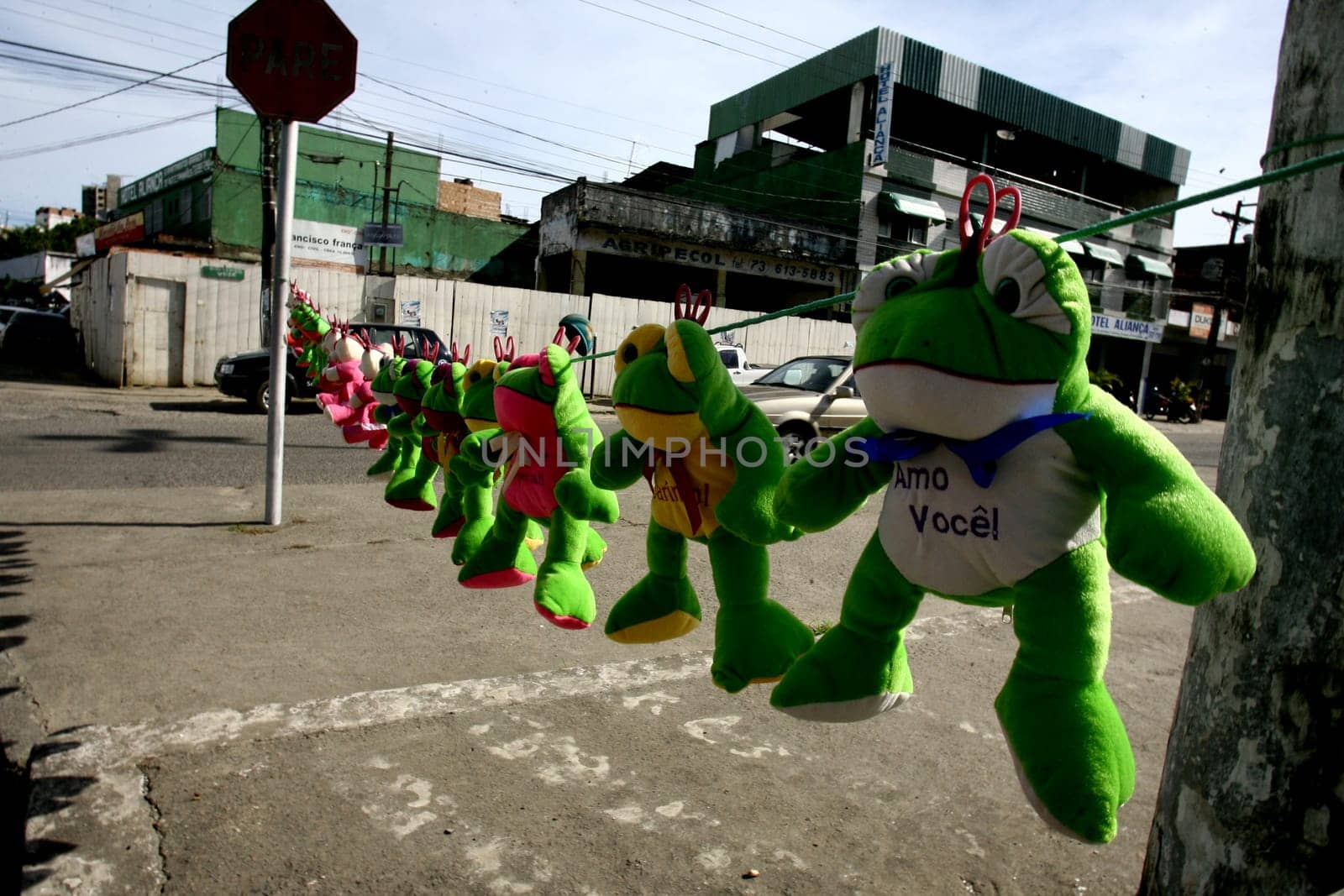 itabuna, bahia / brazil - december 20, 2011: stuffed animals are seen for sale on a clothesline mounted on a street in the city of Itabuna, in southern Bahia.