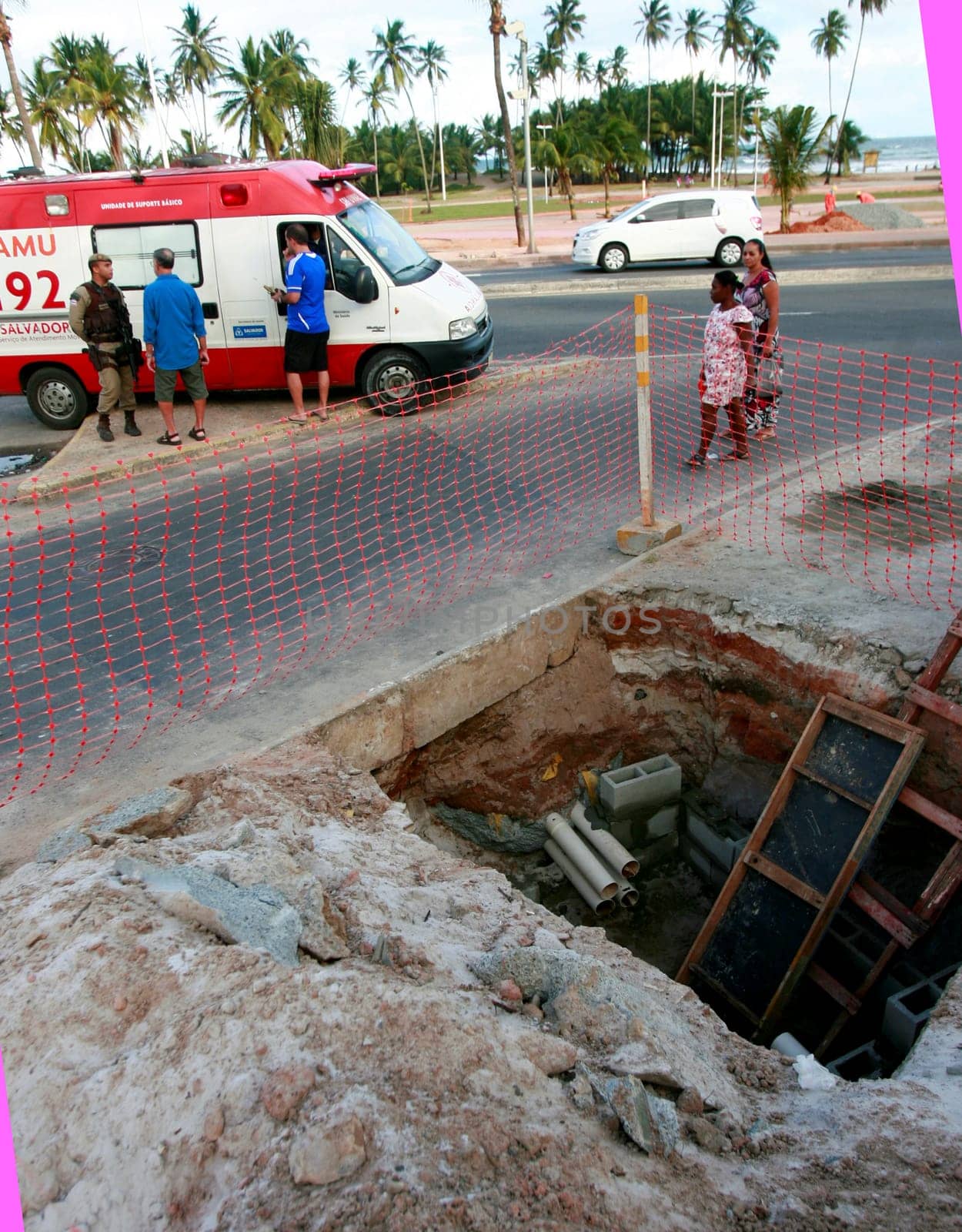 salvador, bahia / brazil - august 13, 2015: Ambulance of the Samu 192 provides average care to a person who fell into a hole in the Itapua neighborhood in the city of Salvador.