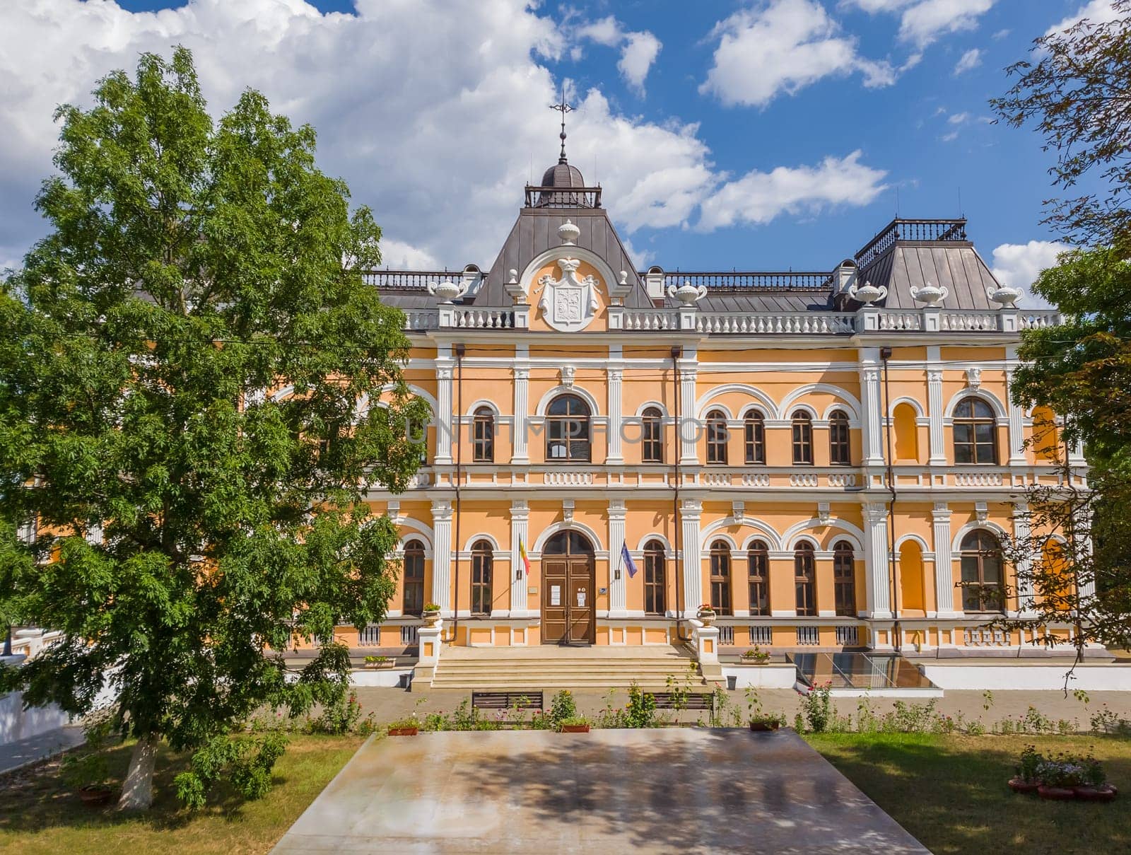The Manuc Bei mansion, an architectural, culture and historic complex with museum, winery and other edifices located in Hincesti city, Moldova. Manuc Bey palace facade and yard in a sunny summer day..