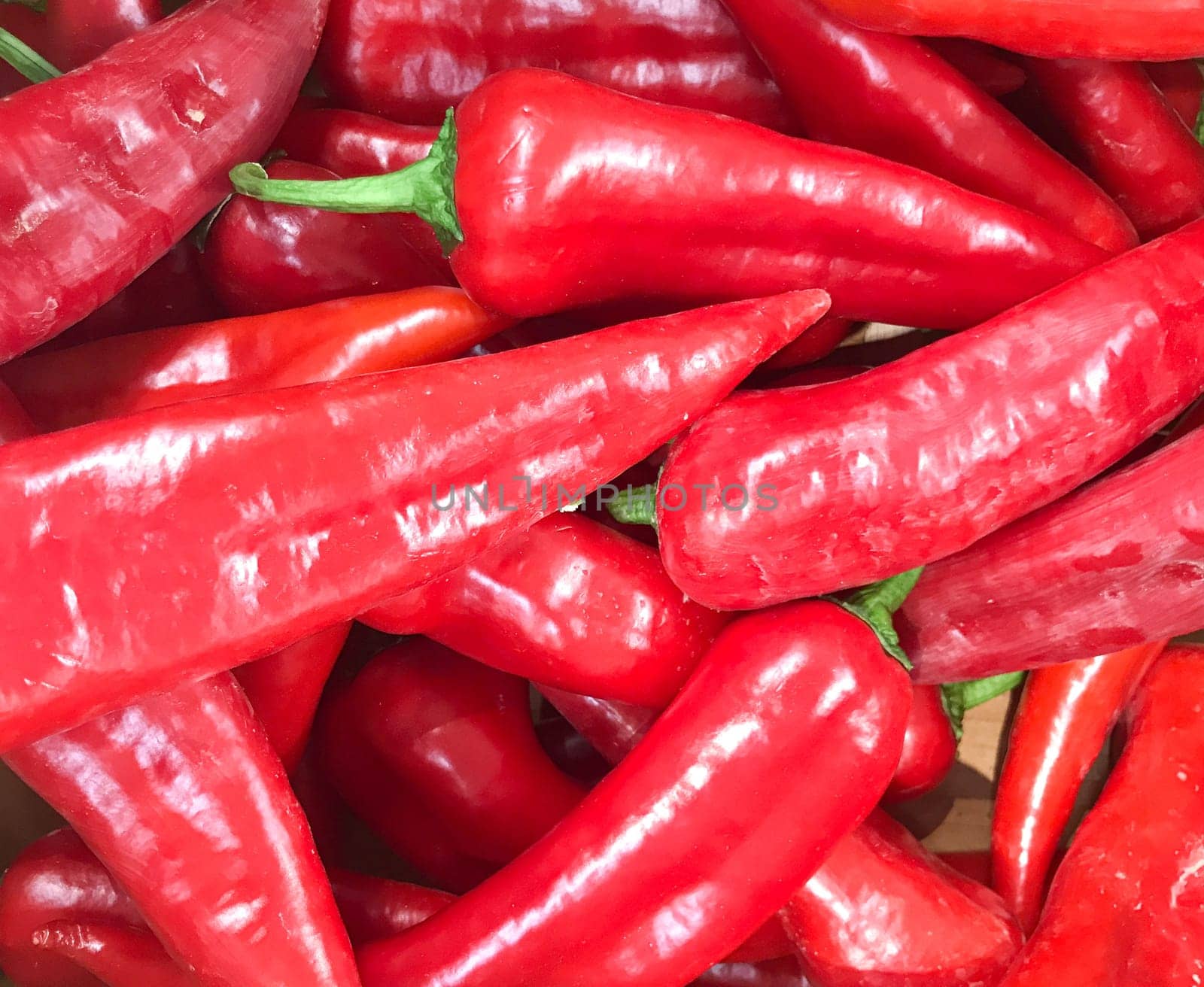 Close-Up Of Fresh Red Peppers. Healthy Fresh Food Background.