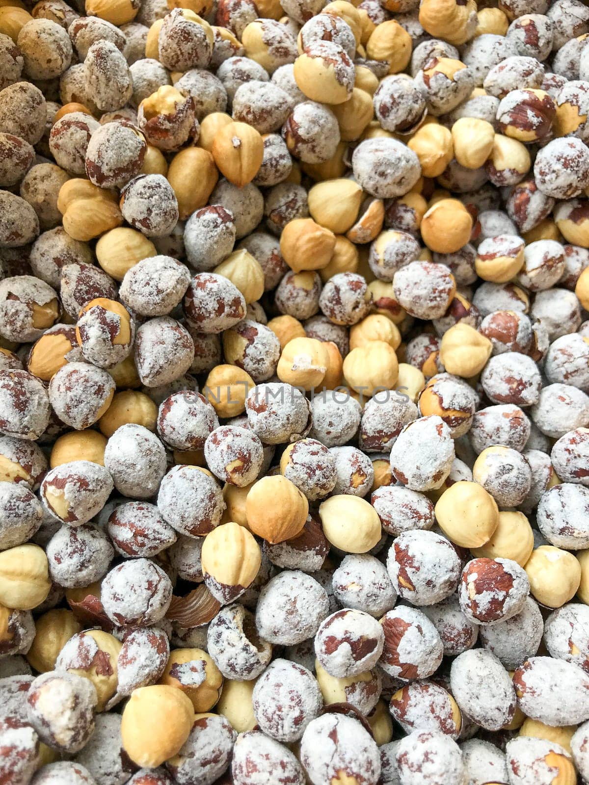 Close-Up Of Peeled Hazelnuts. Healthy Fresh Food Background.