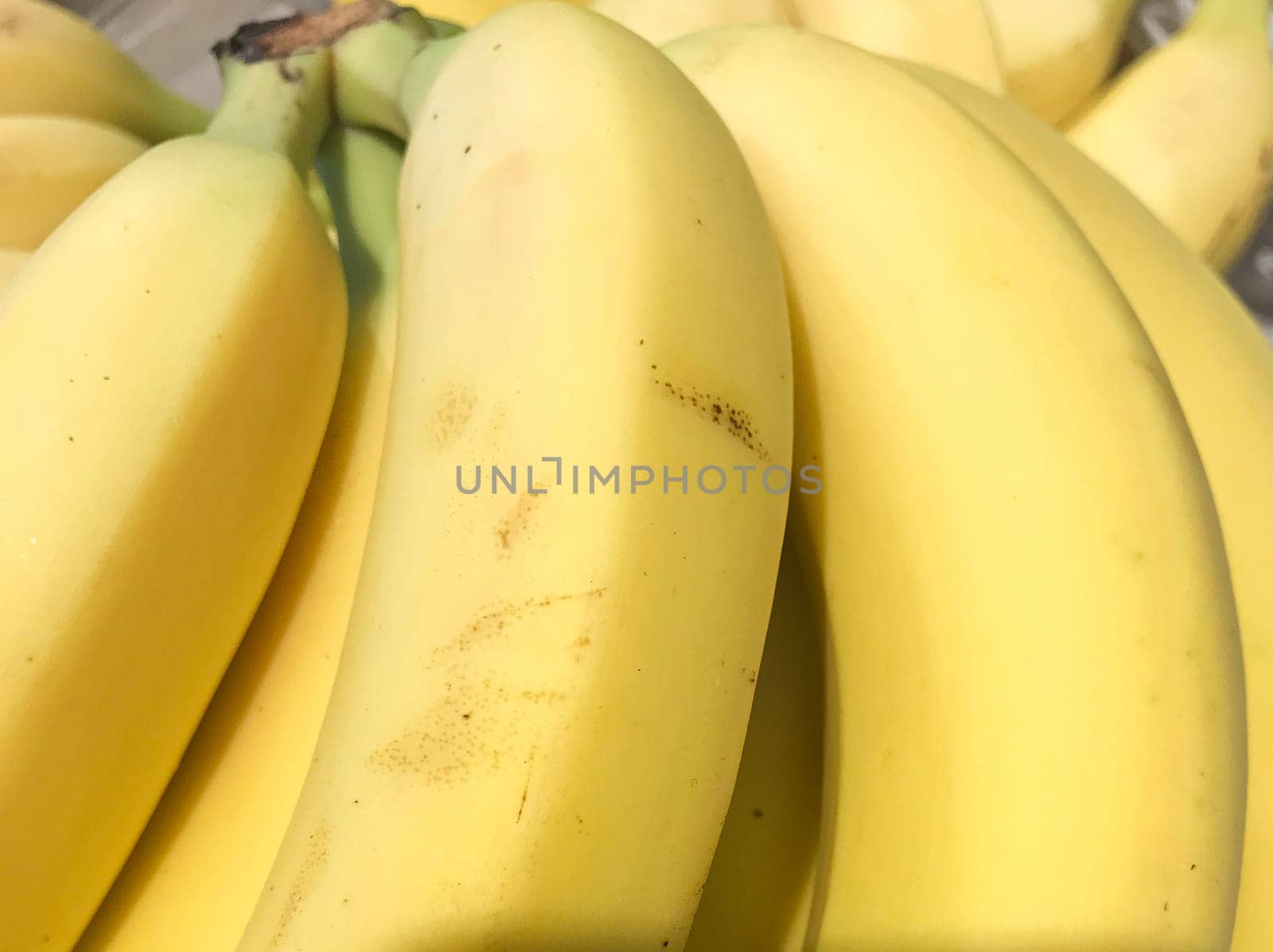 Close-Up Of Ripe Bananas. Healthy Fresh Food Background.